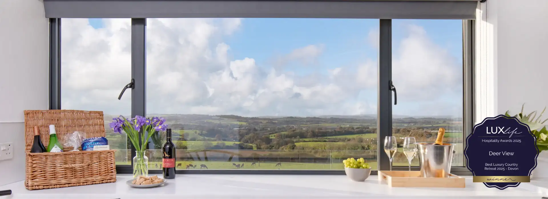 View from kitchen window overlooking deer farm and local countryside