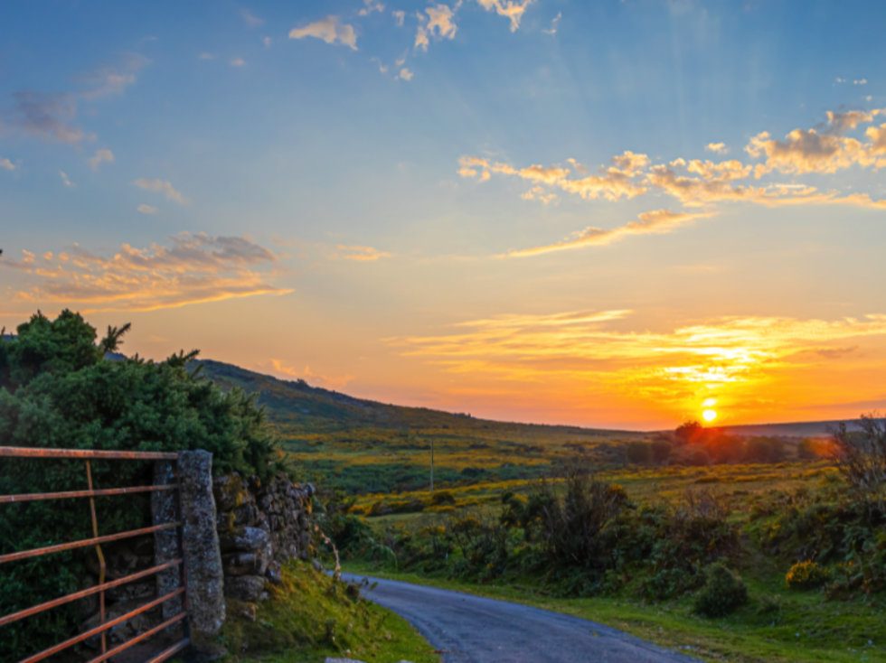 Sunset over a narrow road on Dartmoor