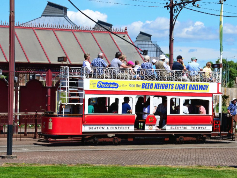 A miniature tram carrying tourists on the Seaton & District Electric Tramway